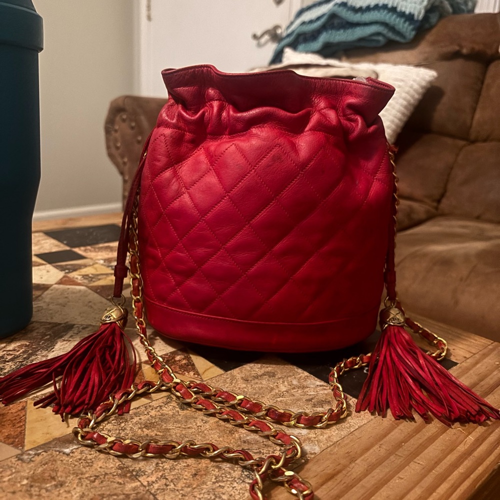 CHANEL Red Quilted Tassel Bucket Bag